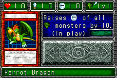 Parrot Dragon (パロット・ドラゴン) — level 1 Dragon, flying — 1 heart, attack 10, defence 10 — faces Sum Sum Sum Sum Mov2 Tra — Raises DEF of all Dragon monsters by 10. (In play)