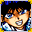 Shaggy black hair, blue eyes, grinning.